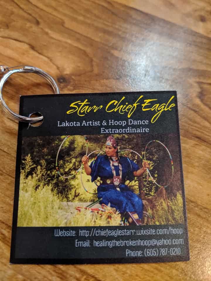 A card for Starr Chief Eagle- a Lakota Artist and Hoop Dancer. It has a picture of her and her contact information.