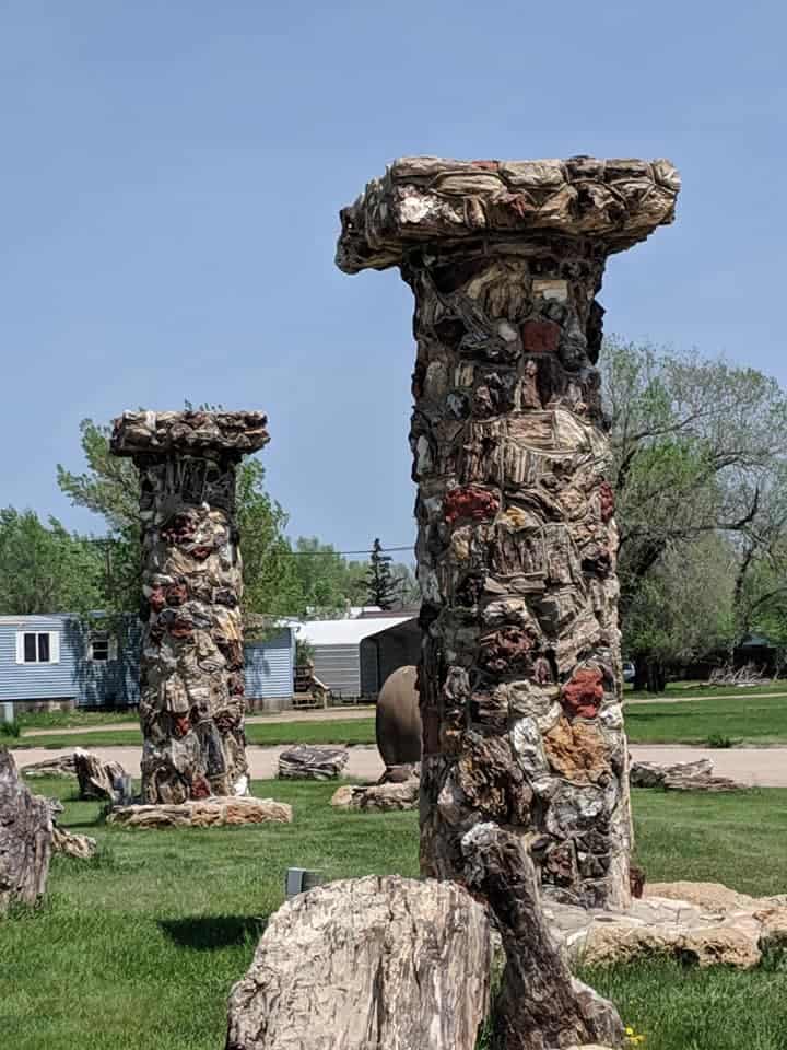 Two columns with a flat square top made of multicolored petrified wood.  This is located in Petrified Wood Park.