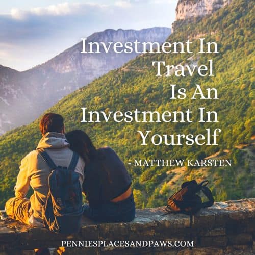 Quote: "Investment in travel is an investment in yourself". Background is a woman resting her head on a man's shoulder. They are sitting on a wall looking at grassy mountains.