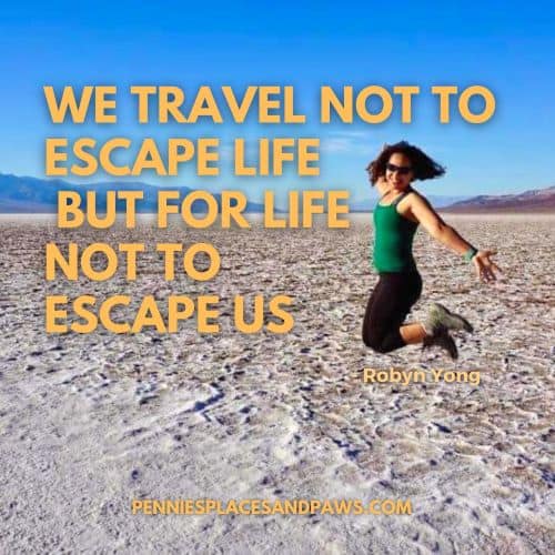 Quote "We travel not to escape life but for life not to escape us" Background is woman midjump surrounded by sand
