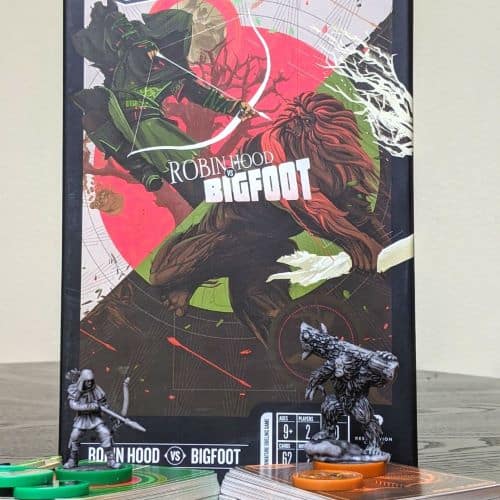 Board game box and figurines of Robin Hood vs Bigfoot Unmatched