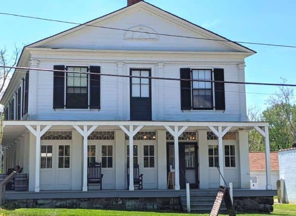 Boston Mill Visitor Center; a 2 story white building with black shutters