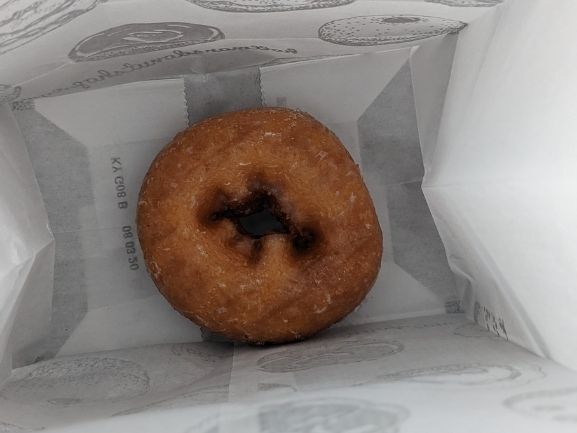 Vanilla vegan donut in a bag