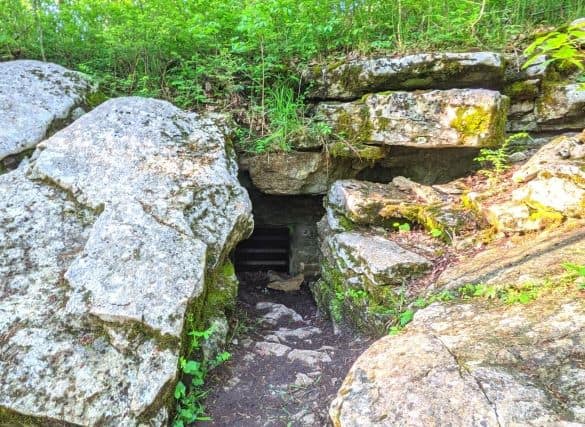 the entrance to White's Cave. You can see the trail that leads to the bar covered entrance between boulders and rocks