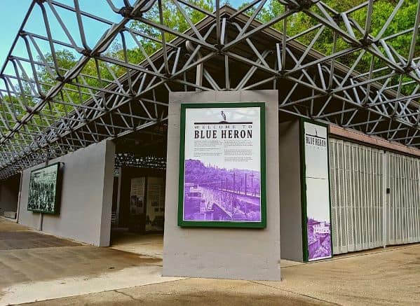 One of the corners of the Blue Heron Interpretive Center. There is a sign that says "Welcome to Blue Heron" and you can see more displays in the background