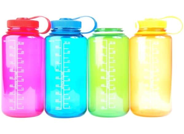 Line of 4 water bottles; one pink, one blue, one green, and one yellow