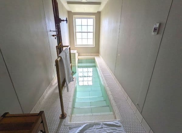 Personal room for Old Roman Bath at Berkeley Springs State Park Spa. It contains a 'tub' built into the floor
