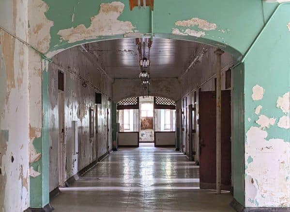 Photogenic Hallway with peeling green paint in West Virginia