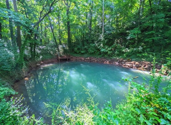 Blue pool of water near Lost River Cave