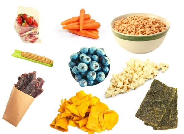 Seaweed crips, carrots, jerky, sweet potato chips, cheerios popcorn, strawberries, blueberries, and peanut butter on celery