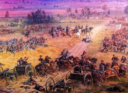 Part of Gettysburg Cyclorama with soldiers charging and horses and wagons down and overturned