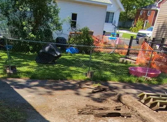 Temporary Chain Link Fence with extra support (cinder blocks at base of posts)