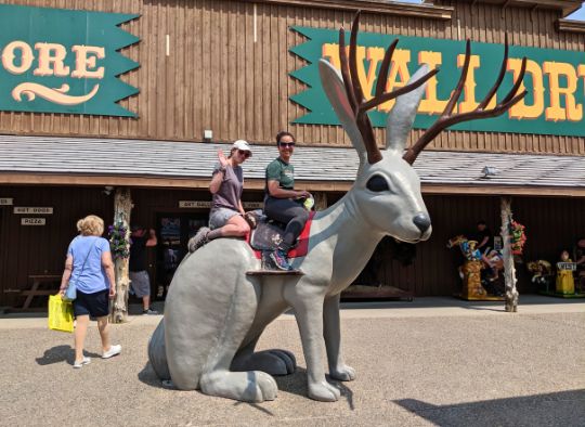 2 women on jackelope photo op at Wall Drug