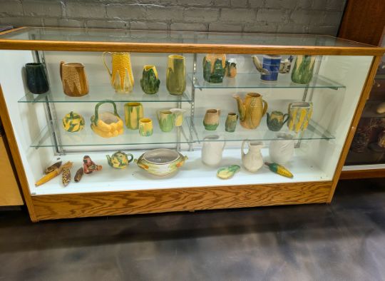 Cabinet of corn pottery on 2nd floor of Corn Palace