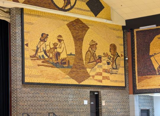 Close up of a Native American corn mural inside the auditorium