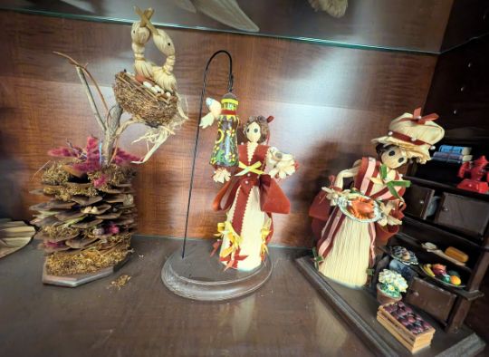 Corn Palace display with corn husk dolls