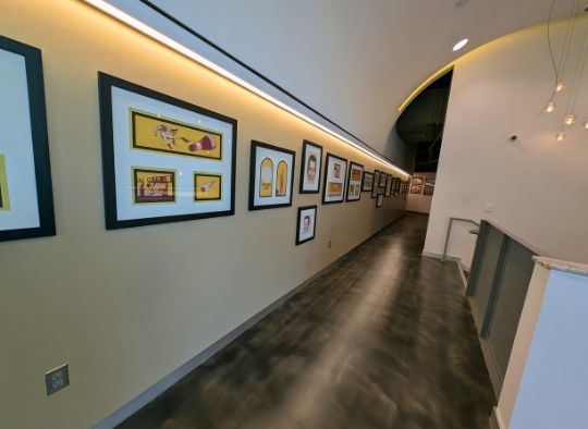 Hallway full of art on 2nd floor of the Corn Palace