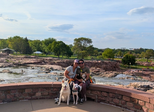Family photo with dogs in front of the Falls  at one of the overlooks